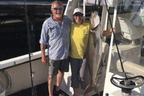 Lady angler with trophy Cobia